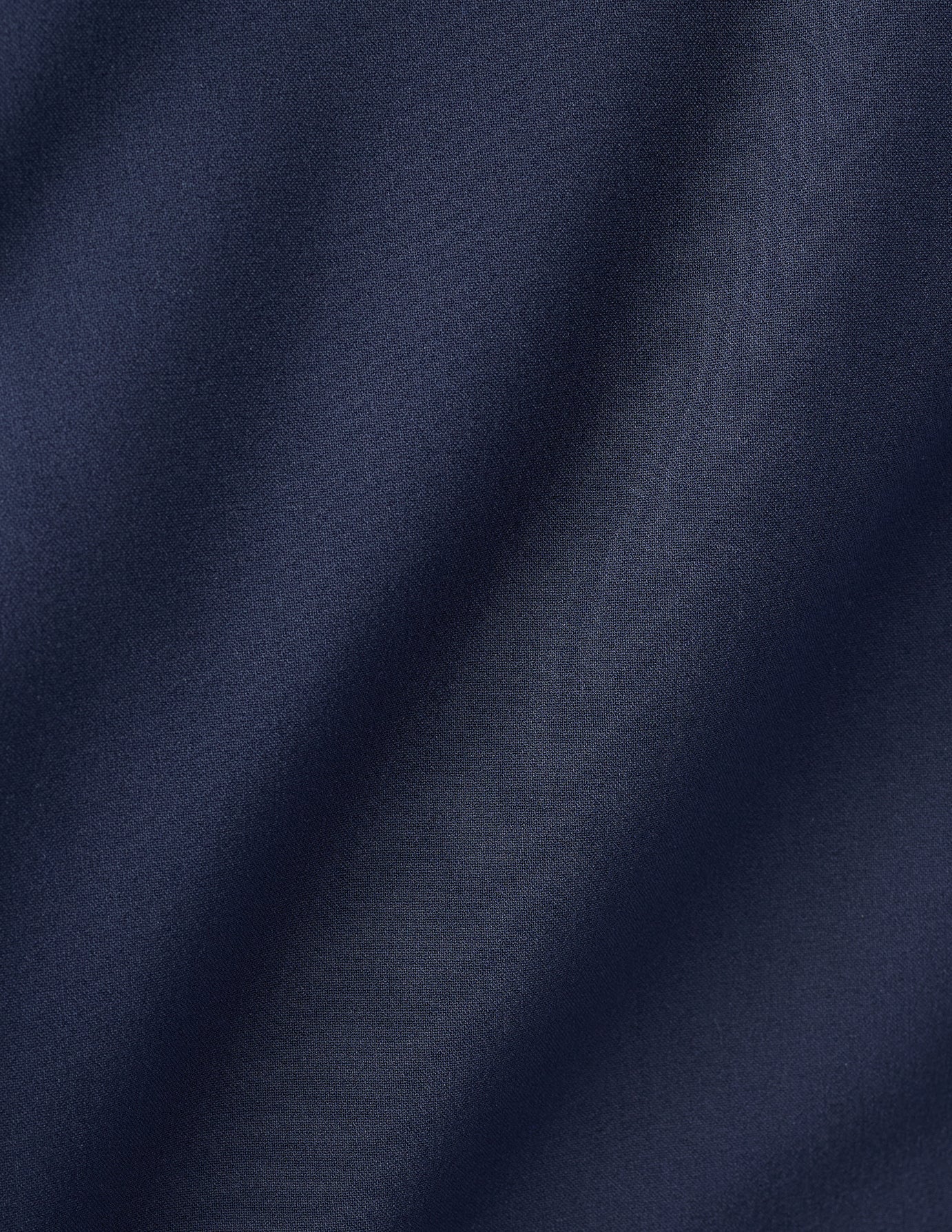 Pantalones Essential Slim azul medianoche